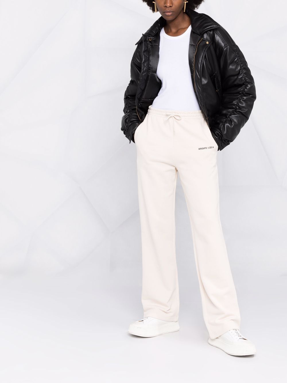 Axel Arigato  logo-print organic cotton flared track pants