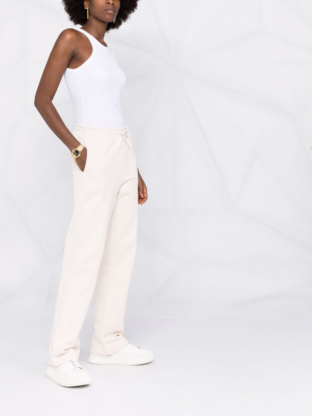 Axel Arigato  logo-print organic cotton flared track pants