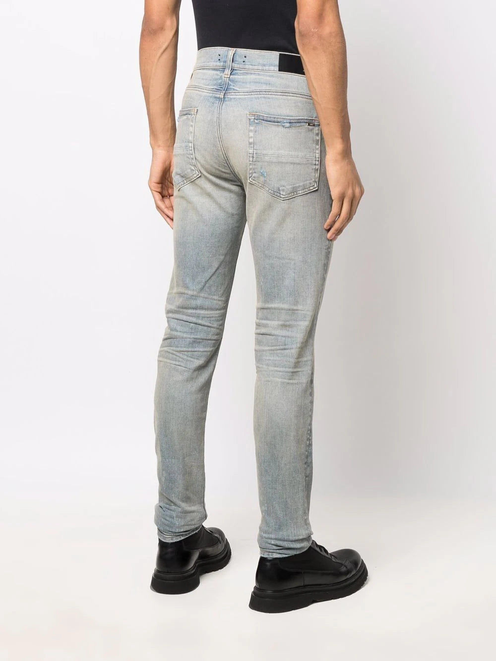 AMIRI  logo-patch stonewashed skinny jeans