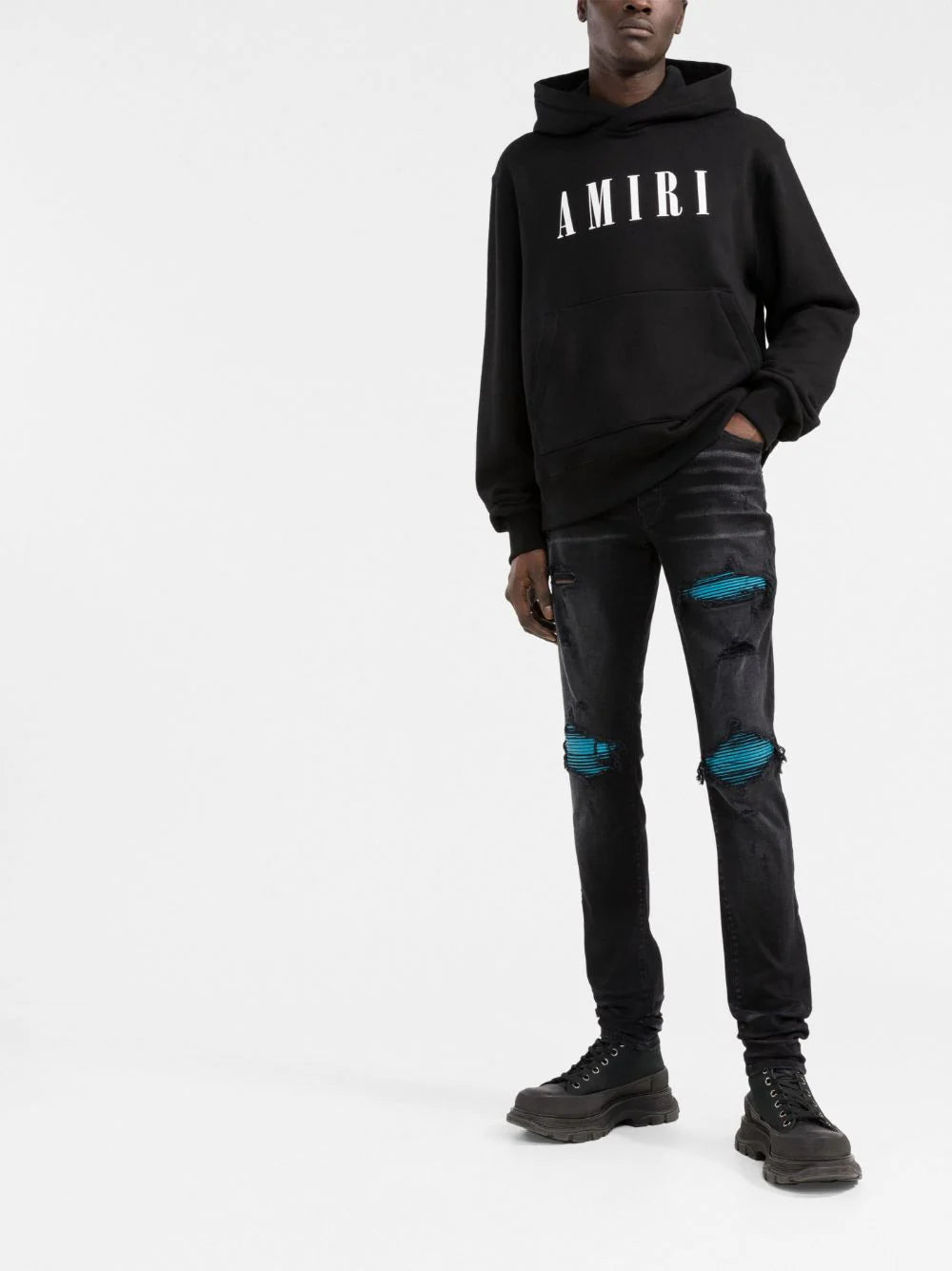 AMIRI  mid-rise distressed skinny jeans