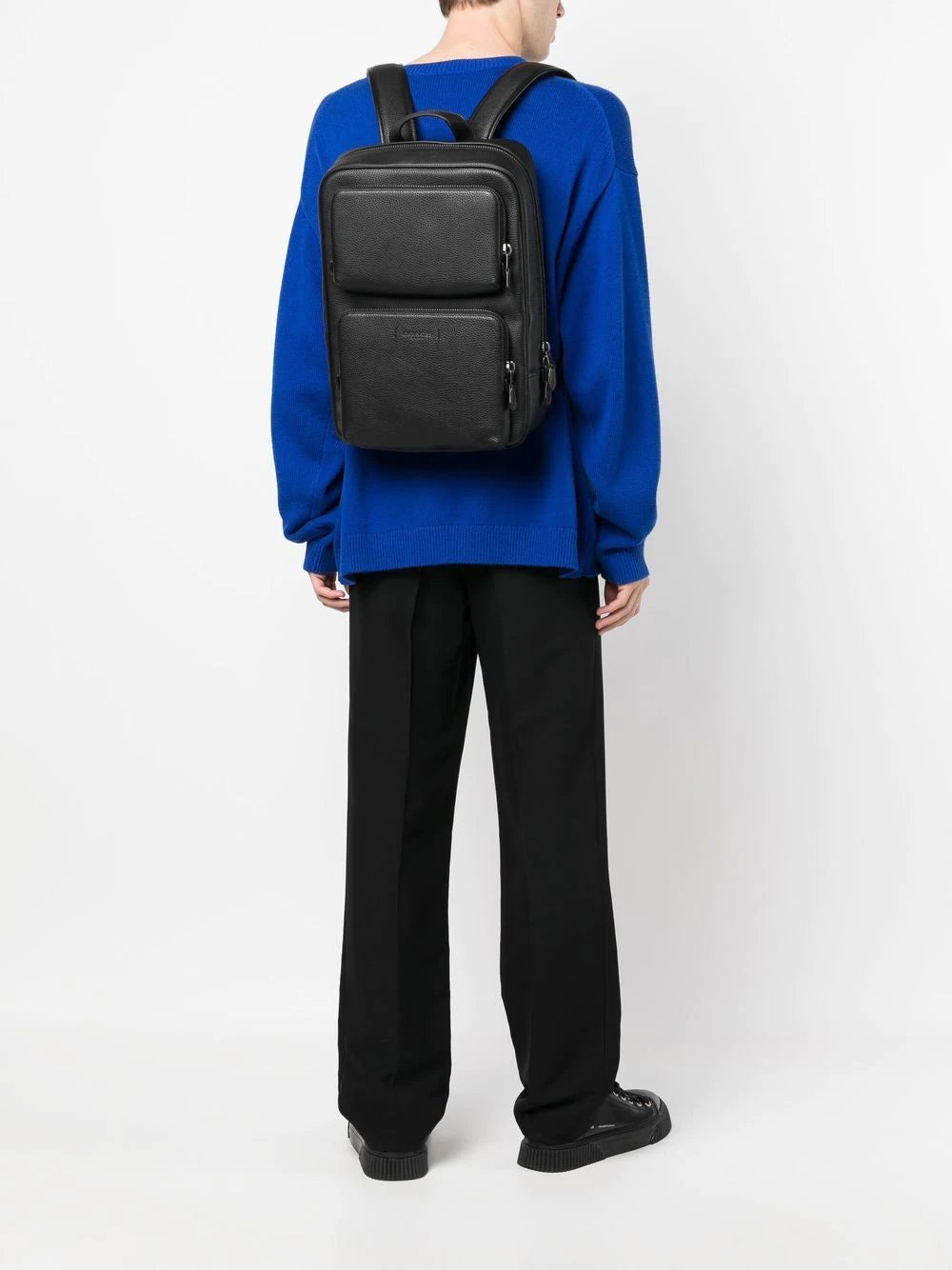 Coach multi-pocket leather backpack