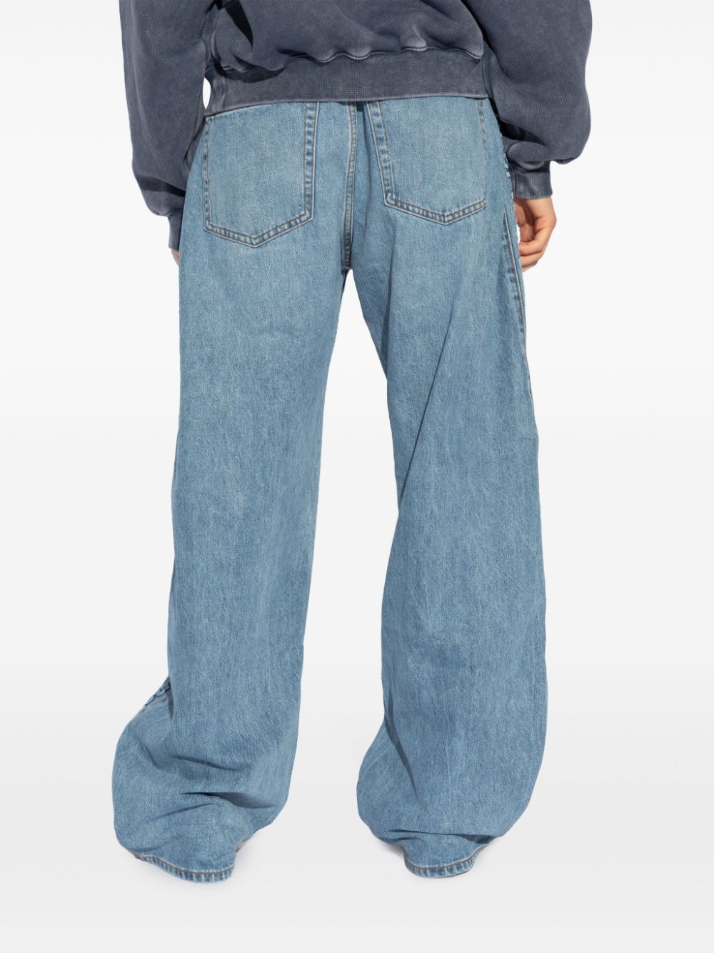 Alexander Wang logo-embossed boyfriend jeans