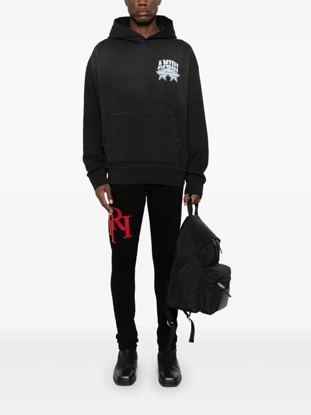 AMIRI  Staggered-logo-embroidered jeans