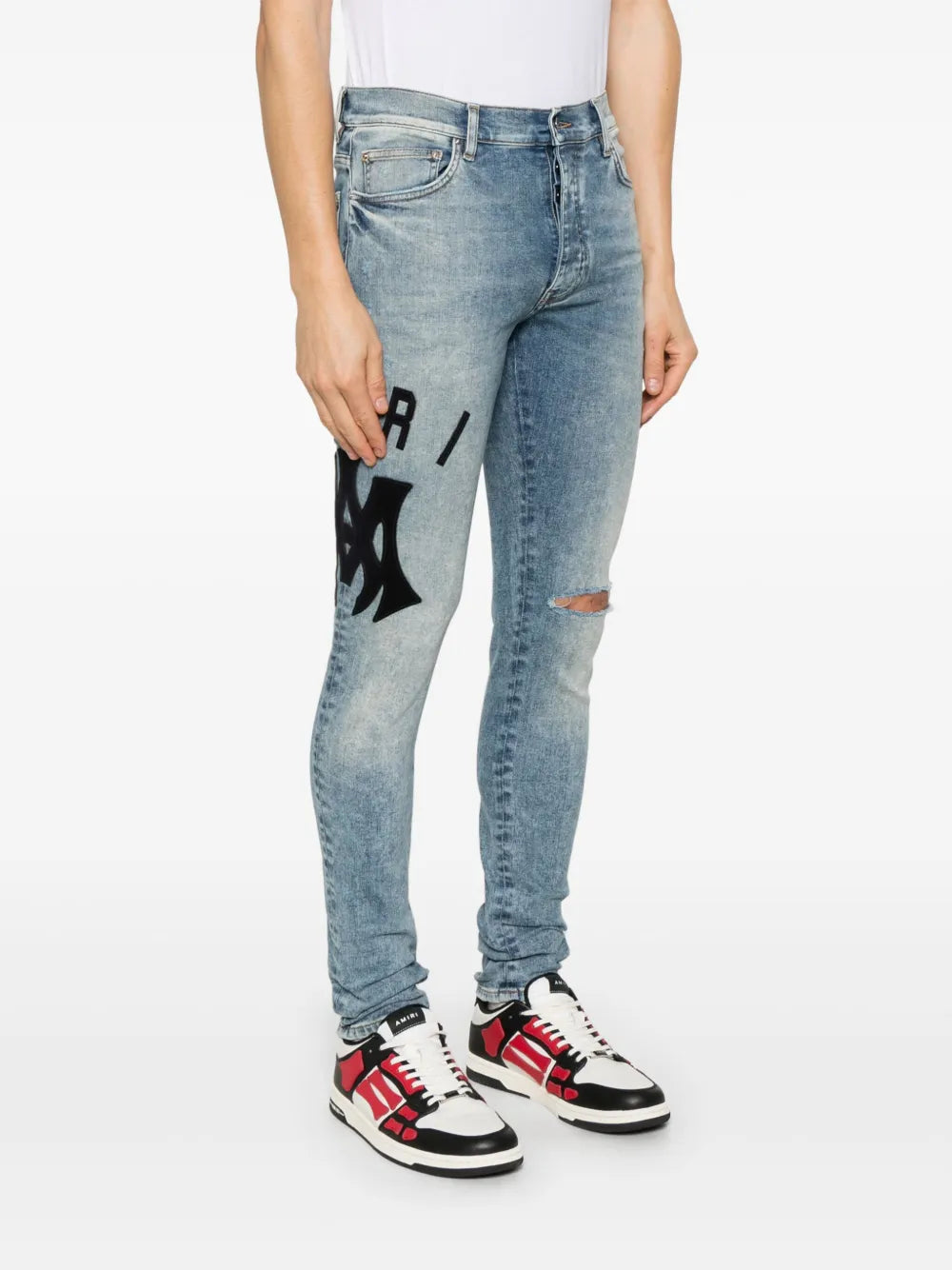 AMIRI  logo-appliqué skinny jeans