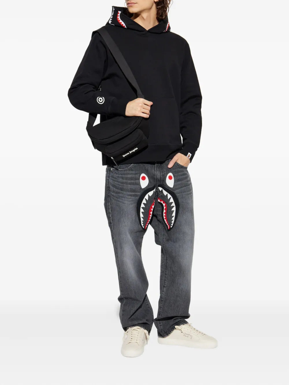 A BATHING APE®  shark-appliqué jeans
