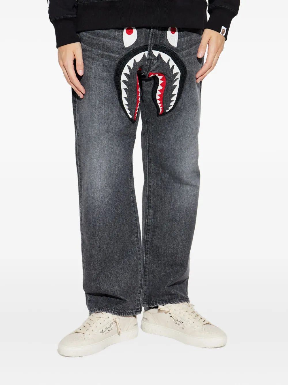 A BATHING APE®  shark-appliqué jeans