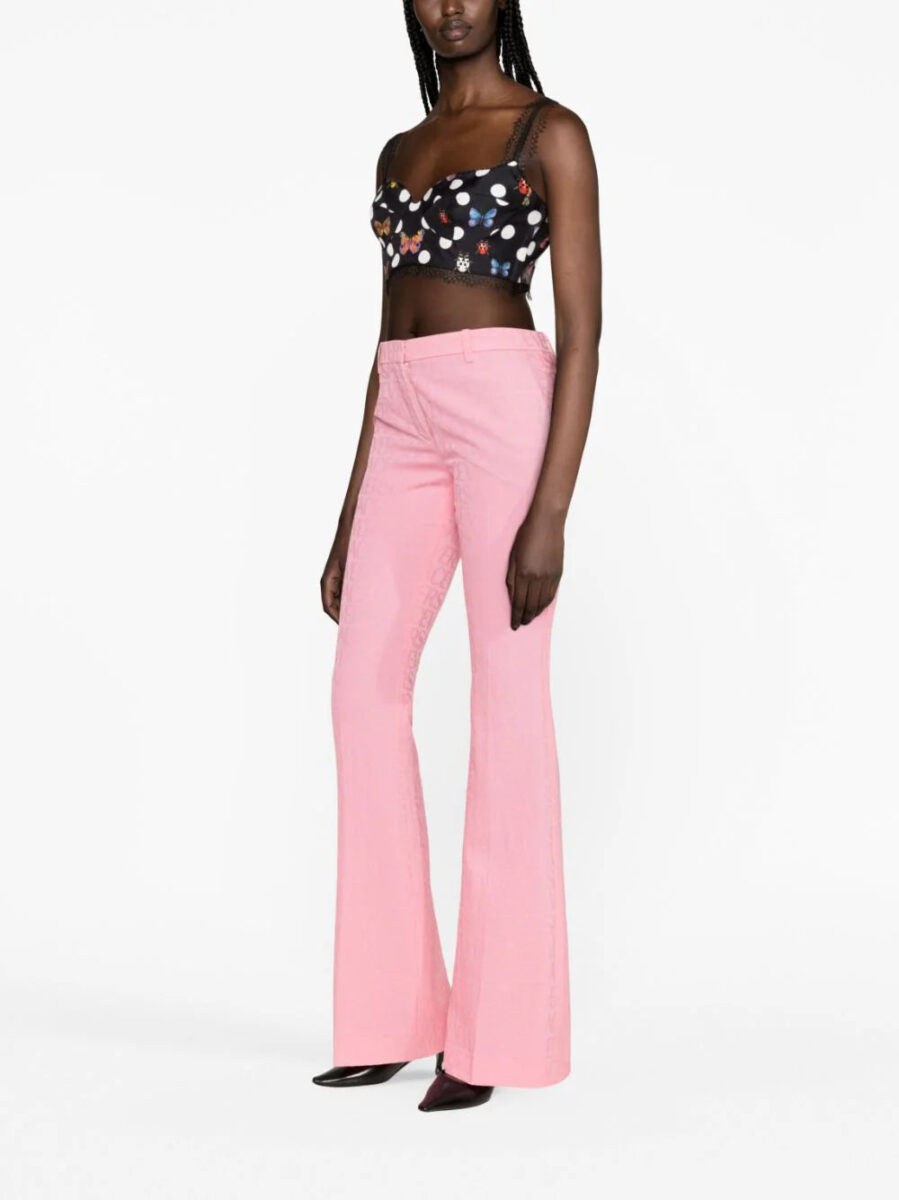 Versace Allover logo flared trousers