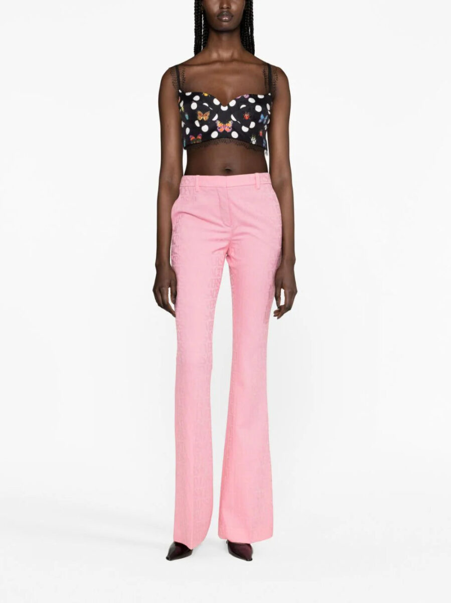 Versace Allover logo flared trousers