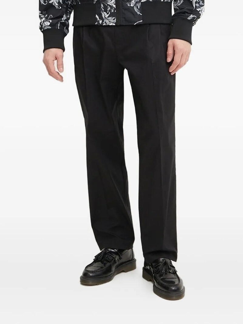 Versace Jeans Couture  logo-appliqué pleat-detail trousers