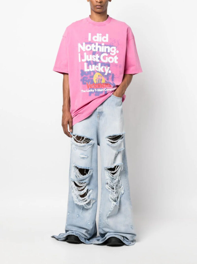 VETEMENTS  ripped-detail denim jeans