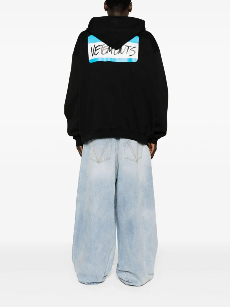 VETEMENTS  Name-tag print zip-up hoodie