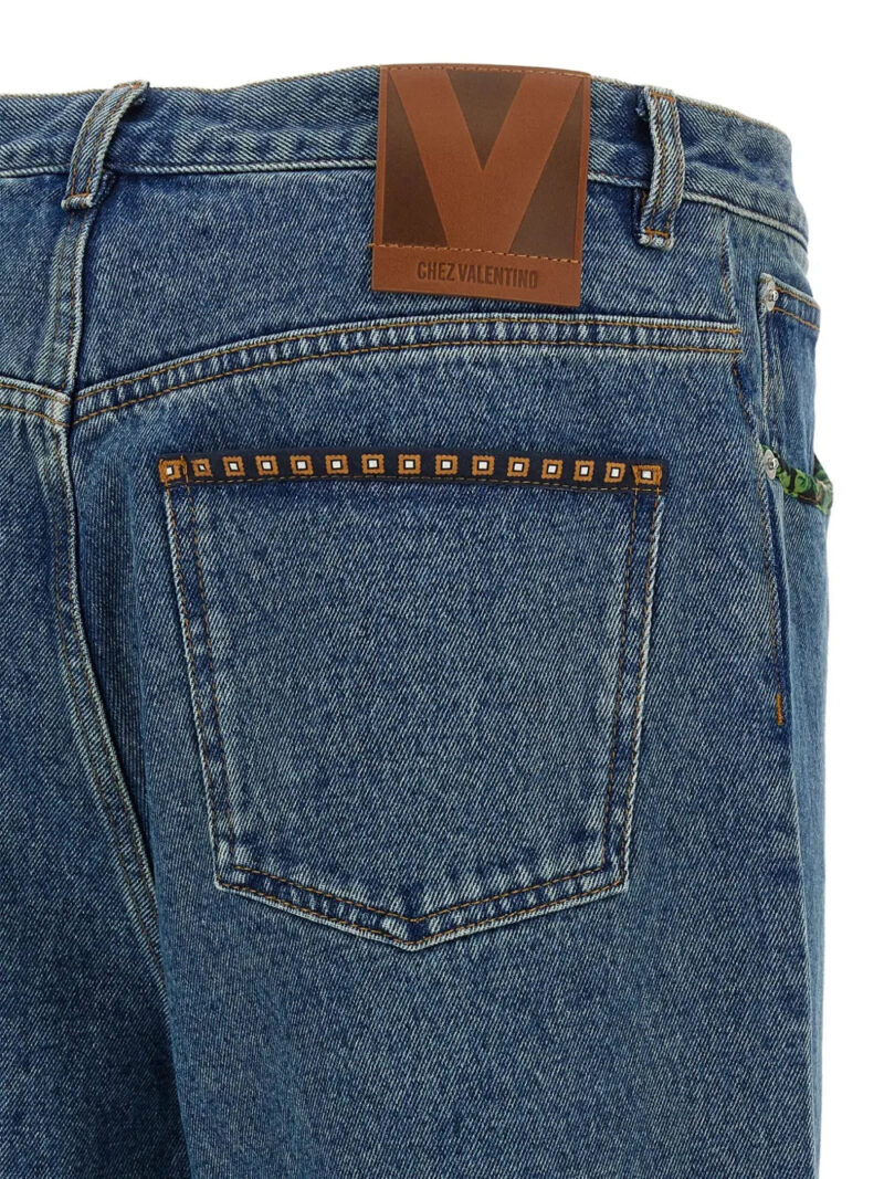 Valentino Garavani  floral-insert jeans