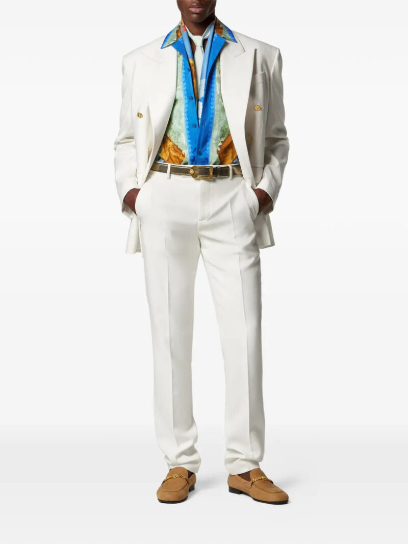 Versace logo-patch trousers