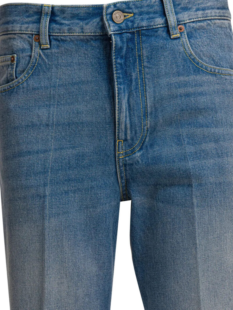 Valentino Garavani logo-patch cuffed denim jeans