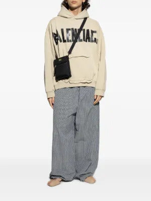 Balenciaga  logo-print frayed-hem hoodie